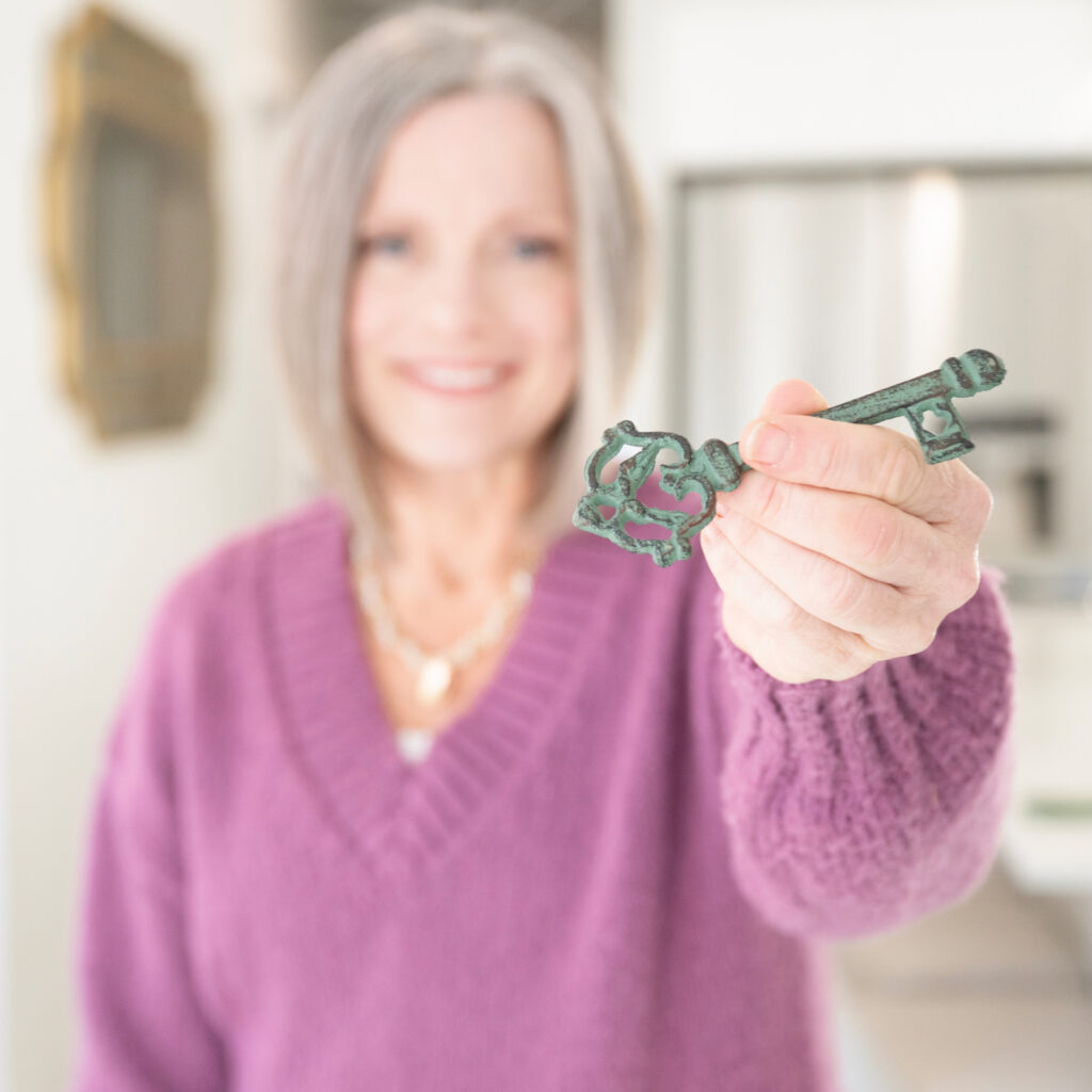 mirror image holding key by the author